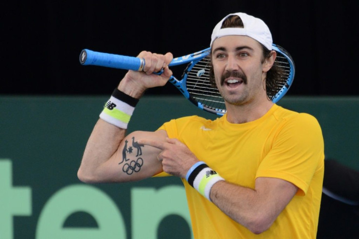 Armed and dangerous: Australian player Jordan Thompson celebrates beating Thiago Monteiro