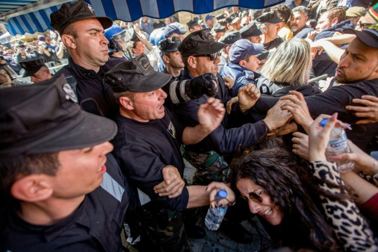 Cypriot protesters clash with police in the UN buffer dividing the capital Nicosia