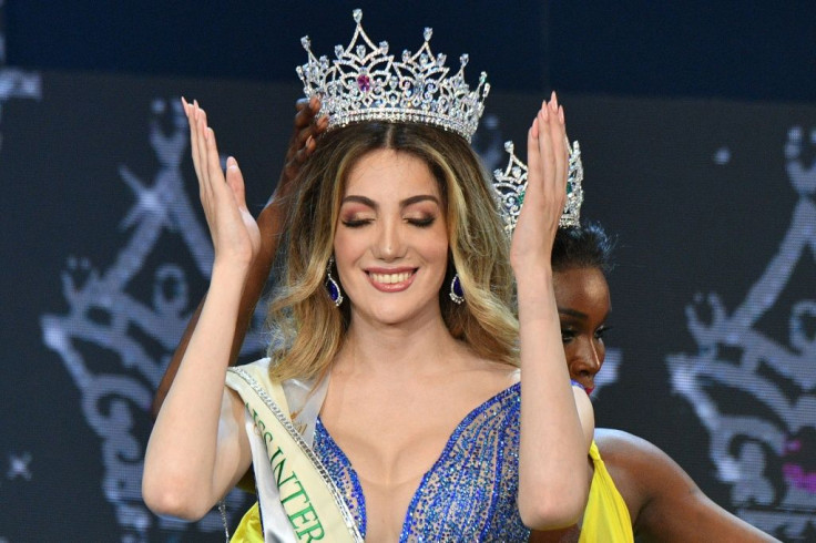 Mexico's Valentina Fluchaire is crowned Miss International Queen 2020 by last year's winner Jazelle Barbie Royale of the United States