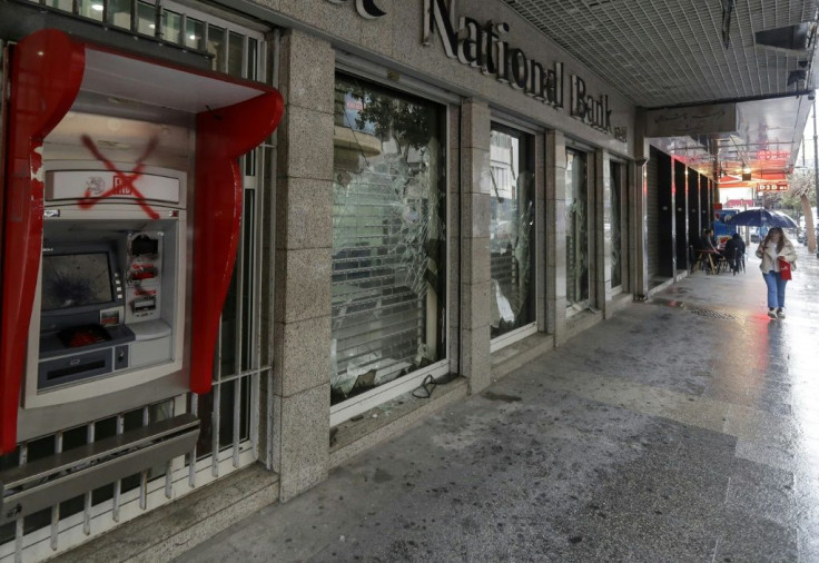 Banks have been vandalised as people vent against withdrawal restrictions
