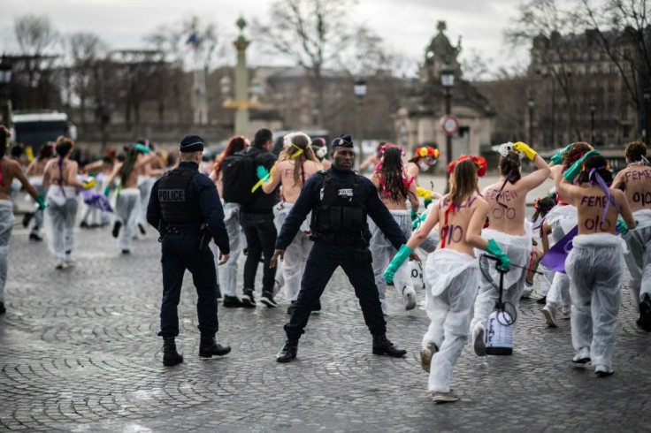 Topless Femen activists demonstrated at Place de la Concorde in Paris denouncing 'the patriarchal pandemic'