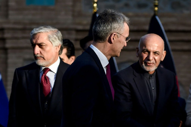 Many Afghans are left despairing for their country's future over the game of thrones between Abdullah Abdullah (L) and President Ashraf Ghani (R), pictured with NATO Secretary General Jens Stoltenberg