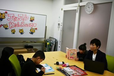 In Japan, some companies have allowed parents to bring children to work during school closures