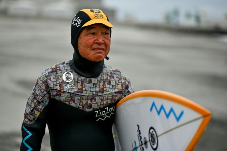 Koji Suzuki surfs come rain or shine