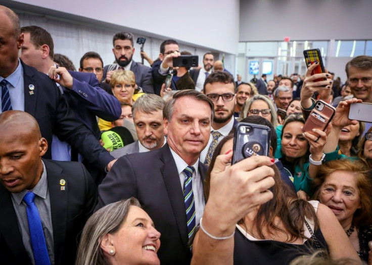 Brazilian President Jair Bolsonaro greets Miami's Brazilian community after an event at Miami Dade College's Medical Campus in Miami, Florida, on March 9, 2020