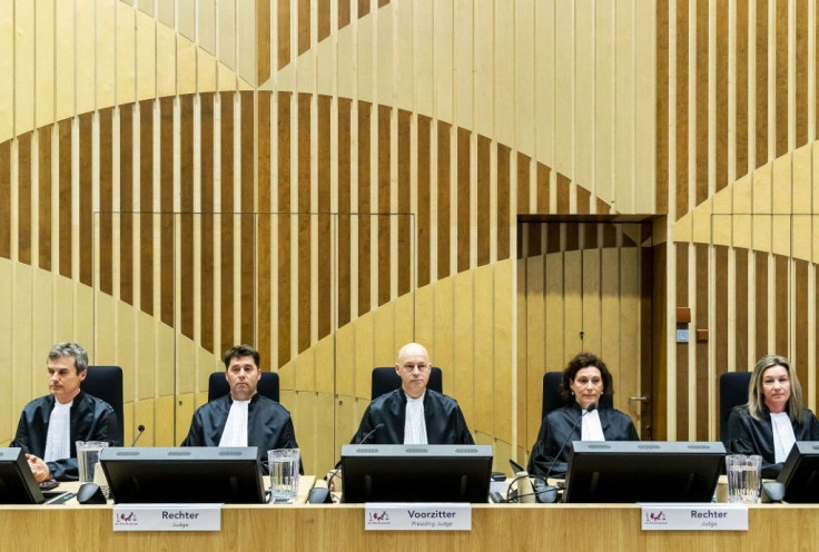 The trial of four suspects -- three Russians and a Ukrainian -- opened in the Netherlands on Monday