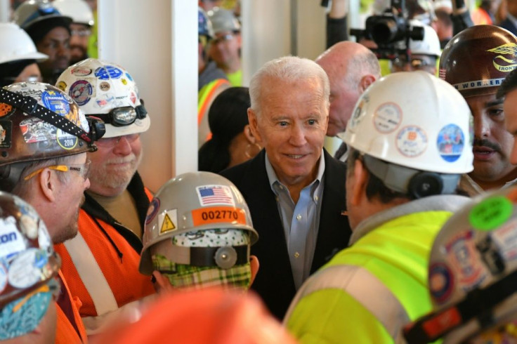 Democratic presidential candidate Joe Biden meets workers as he tours the Fiat Chrysler plant in Detroit