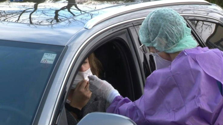 In the small German town of Gross-Gerau, you don't go to the drive-through for a burger and fries. You go to get tested for the novel coronavirus.