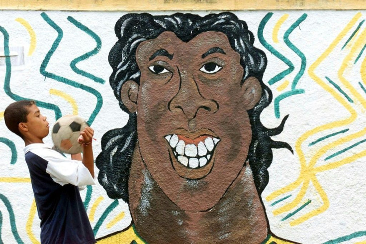 Ronaldinho, immortalized in this mural pictured in 2002 in Rio de Janeiro, is considered one of the greatest footballers of all time