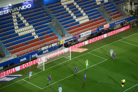 The match between Eibar and Real Sociedad, cancelled in February following a landslide into a nearby rubbish dump, on Tuesday became the first Liga game played behind closed doors because of coronavirus