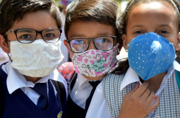 Colombian schoolchildren use masks recyclable and biodegradable materials following a shortage of medical masks as the country fights the spread of the coronavirus