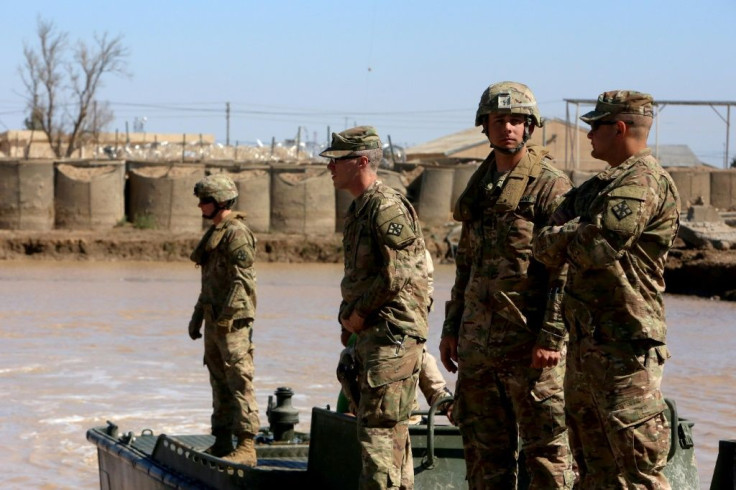 US army forces supervise during a training session at the Taji camp, north of Baghdad -- the site of Wednesday night's rocket attack