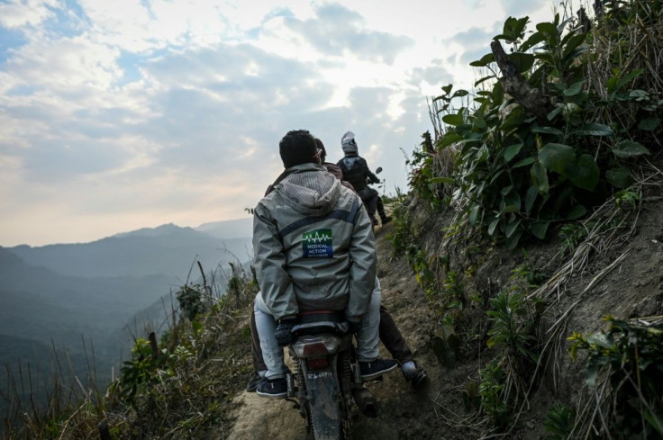 Intrepid health workers head to the remote communities by motorbike, foot and even boat, often braving hairpin bends and ramshackle bridges