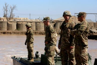 US troops supervise a training session at the Taji camp, north of Baghdad - the site of the Wednesday night rocket attack