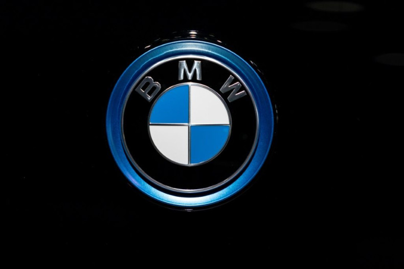 A BMW automobile logo is pictured January 9, 2020 in Brussels; The European Commission has accused BMW, Volkswagen and Daimler of avoiding competition with each other on technologies that reduce harmful emissions