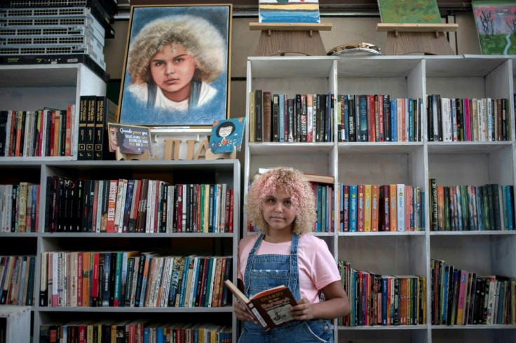After 12-year-old Lua Oliveira's call for books went viral, she has been receiving around 1,500 a week -- way more than her small library can hold
