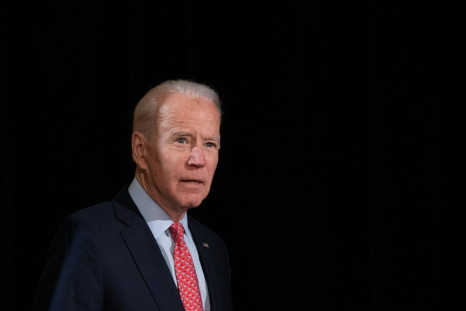 Former US vice president and Democratic presidential hopeful Joe Biden arrives to speak about COVID-19 on March 12