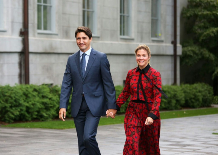 Prime Minister Justin Trudeau and his wife Sophie, seen here in September 2019, along with their three children, are under quarantine after she tested positive for the new coronavirus.