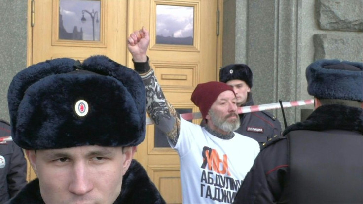 The protesters expressed support for seven young men handed long jail terms after convictions last month on terrorism charges -- the group said they were tortured while in custody