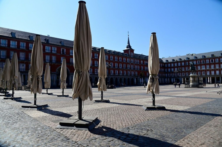 Public spaces such as the Plaza Mayor in central Madrid have already largely emptied