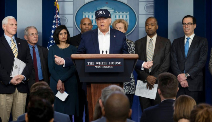 US President Donald Trump (C, pictured with members of the Coronavirus Task Force at the White House) reportedly is trying to poach German scientists working on an experimental vaccine against the virus