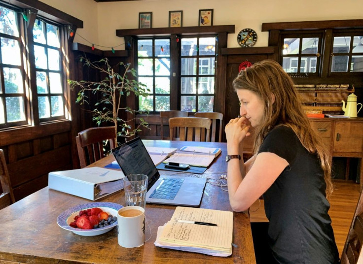 Martha Lackritz-Peltier, attorney at TechSoup, works from her living room in Oakland, California, because of the coronavirus-related measures taken by her organization