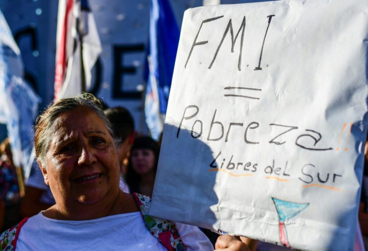 People protest against the IMF outside the Argentine Congress, on February 12