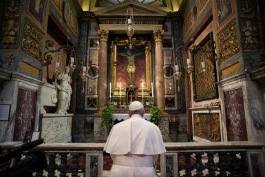 The 83-year-old pontiff's unannounced visit to a church with a crucifix from the times of the Great Plague came with Italy's hospitals running out beds
