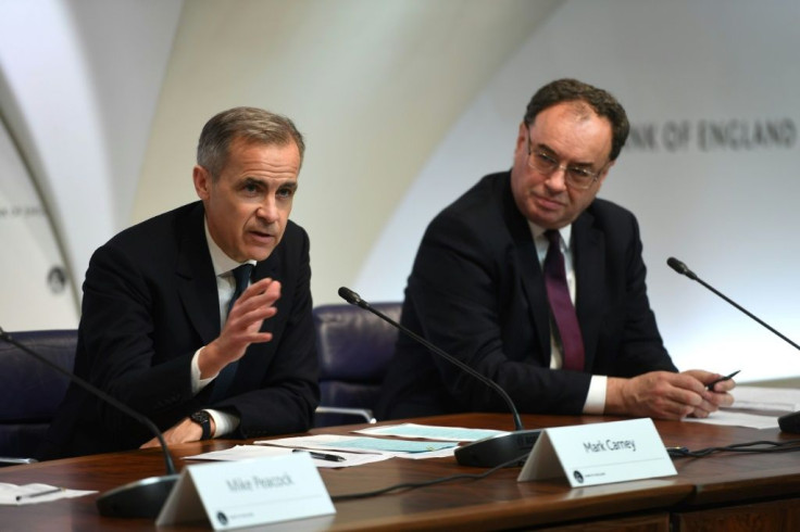 Outgoing Governor of the Bank of England Mark Carney (L) and incoming Governor Andrew Bailey (R) at a press conference announcing an emergency rate cut last week to deal with the coronavirus crisis