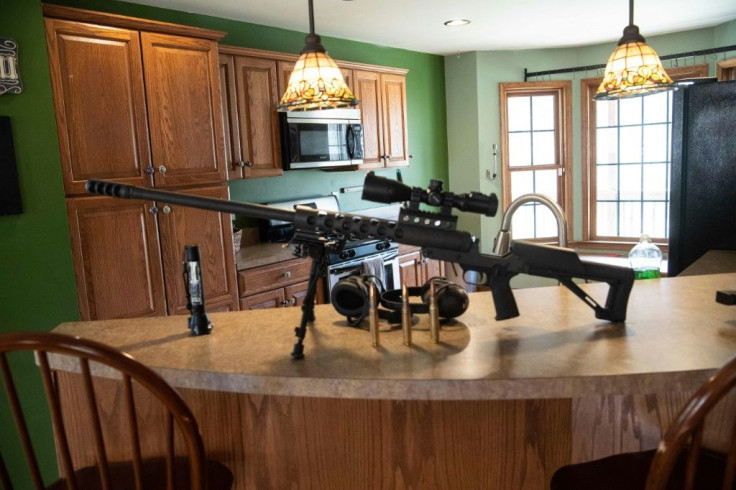 A 50-caliber gun sits on a counter top inside the Fortitude Ranch in Mathias, West Virginia, to show would-be new recruits just how seriously the members take this enterprise