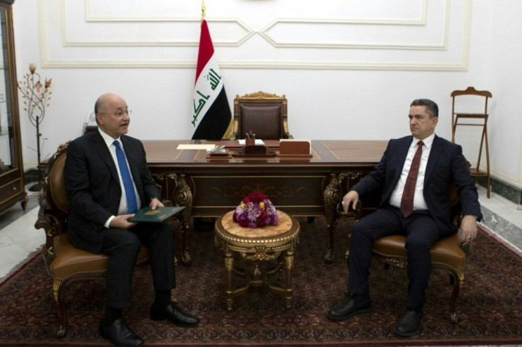 Iraqi President Barham Saleh (L) meets Prime Minister-designate Adnan al-Zurfi in Baghdad