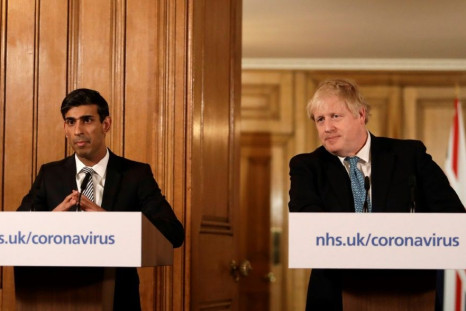 Prime Minister Boris Johnson's (R) finance minister Rishi Sunak (L) launched a budget package of stimulus measures worth Â£30 billion ($39 billion, 34.4 billion euros) to fight the growing threat from the coronavirus epidemic to the economy