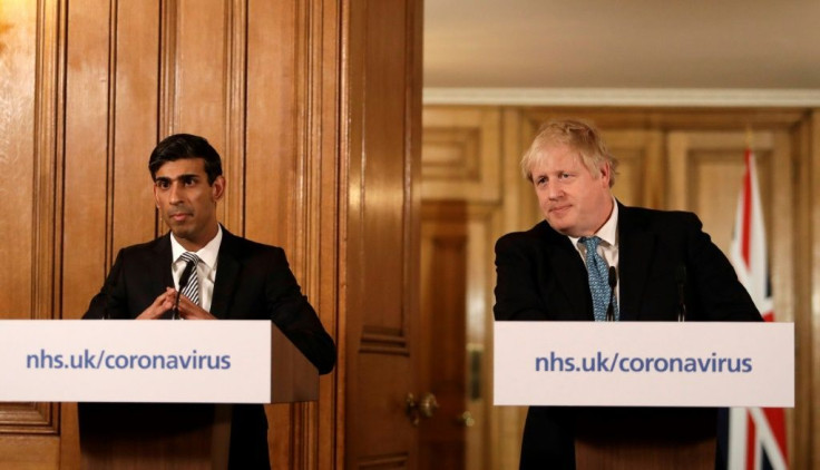 Prime Minister Boris Johnson's (R) finance minister Rishi Sunak (L) launched a budget package of stimulus measures worth Â£30 billion ($39 billion, 34.4 billion euros) to fight the growing threat from the coronavirus epidemic to the economy