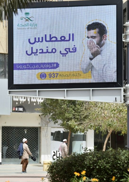 "Sneeze in a tissue" reads a health ministry billboard in central Riyadh