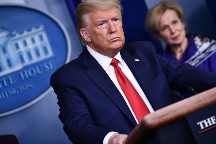 US President Donald Trump listens to a question during the daily briefing on the novel coronavirus on March 18