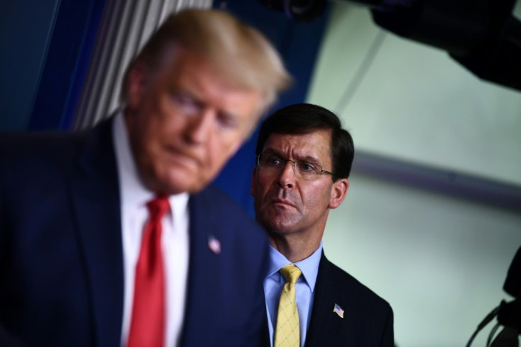 US Defense Secretary Mark Esper attends the daily briefing on the novel coronavirus, COVID-19, alongside President Donald Trump