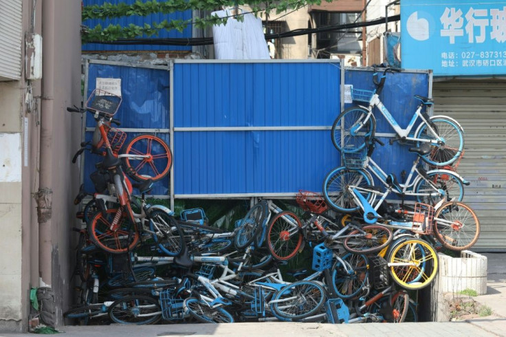 Gaps in barriers have been blocked with shared-use bikes in parts of Wuhan
