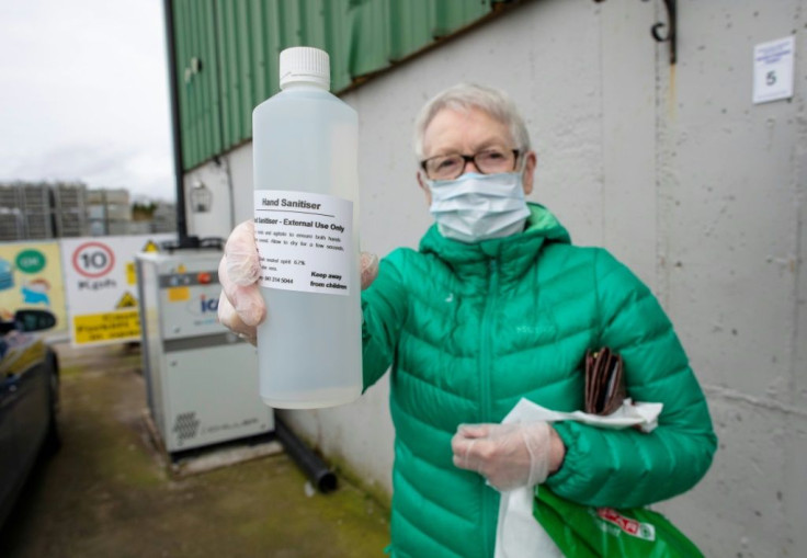 One elderly customer sported a surgical mask as she made her purchase