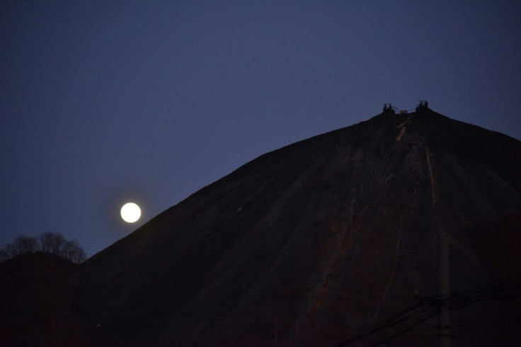 Gutted factories, rusting pickaxes and crumbling homes that will soon be abandoned dot the scarred hills in Mentougou -- home to Beijing's last coal mine slated to close this year as the city battles chocking smog