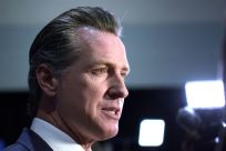 California Governor Gavin Newsom, pictured in December 2019, said California's measure will likely not be enforced by police