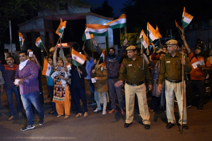 Celebrations outside the gates of Tihar Jail in New Delhi marked the execution of four men convicted of the 2012 gang-rape and murder of a student