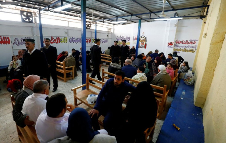 Prisoners meet with relatives during visiting hours at Cairo's Tora prison