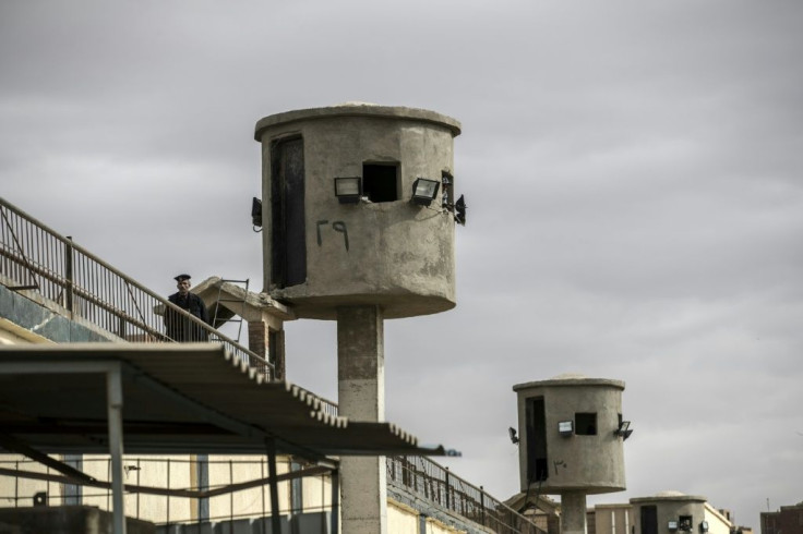 An Egyptian policeman stands guard at Tora prison in Cairo