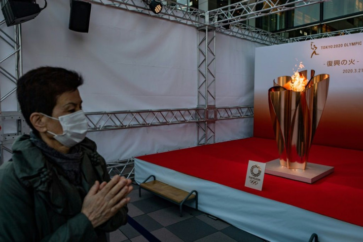 The Olympic flame is to beging touring Japan but calls are growing louder for the Tokyo Games to be delayed due to the coronavirus pandemic
