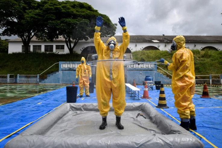 Brazilian firefighters participate in training in Belo Horizonte on March 20, 2020