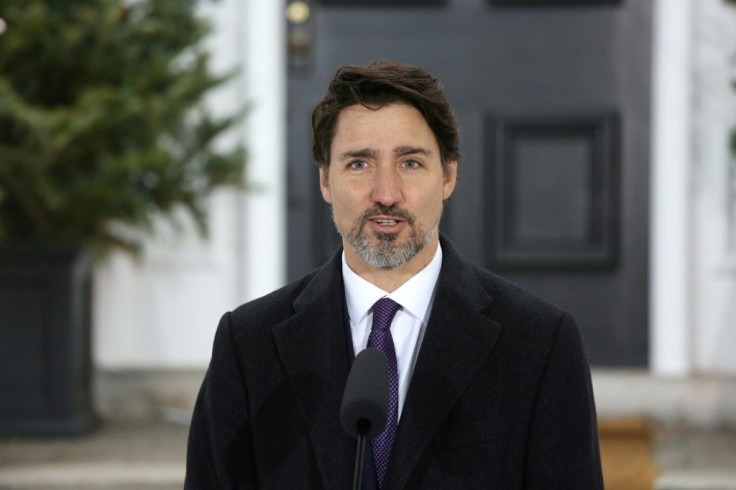 Canadian Prime Minister Justin Trudeau, pictured March 20, 2020, had announced a coronavirus aid package of Can$82 billion (US$57 billion)