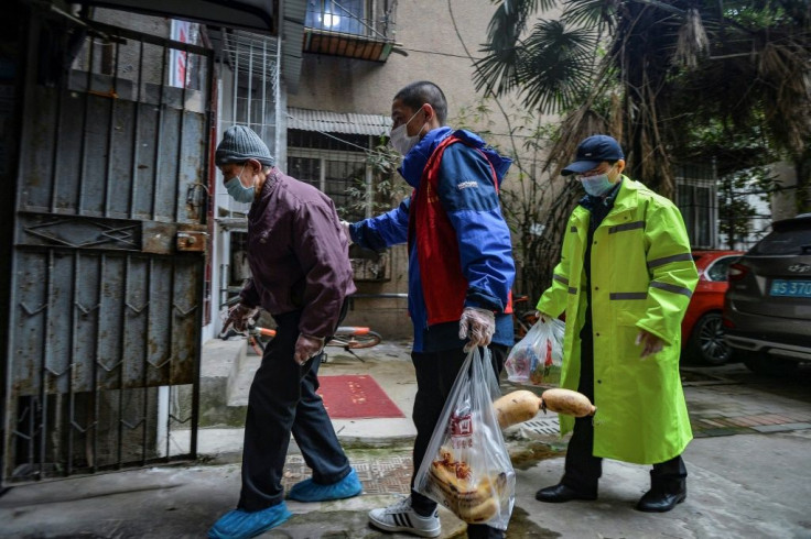 Wuhan residents considered healthy are allowed to move around the Chinese city and take the bus or metro so long as they show ID