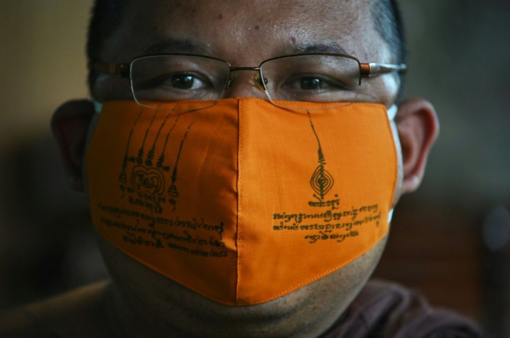 A group of innovative monks near Bangkok are turning to their Buddhist faith in a bid to help contain the new disease