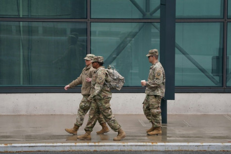 Army National Guard arrive at the Jacob Javits Center as New York Governor Andrew Cuomo announces plans to convert the Jacob Javits Center on Manhattanâs West Side into a field hospital as Coronavirus cases continue to rise on March 23, 2020 in New York