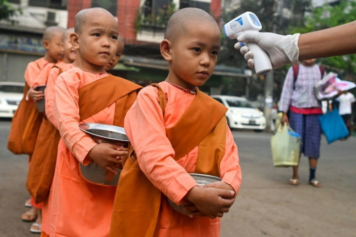 Young nuns in Yangon had their temperature checked as a preventive measure against spreading the COVID-19 novel coronavirus